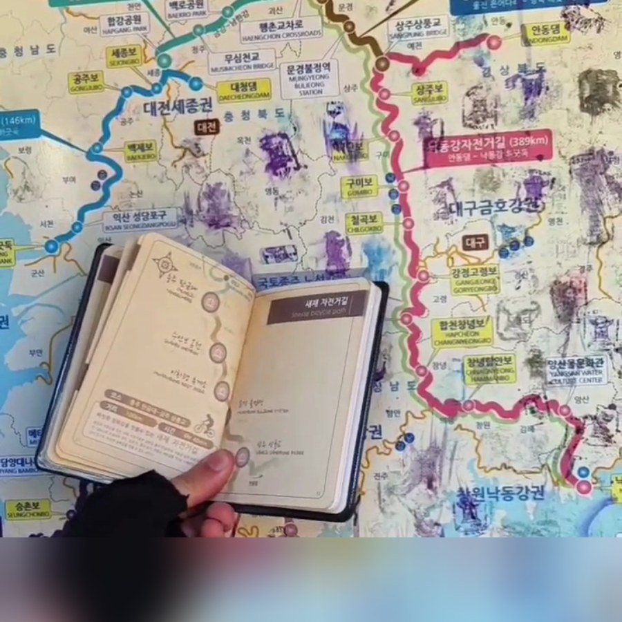 Korea 4 Rivers cycling passport stamp booklet at certification center map