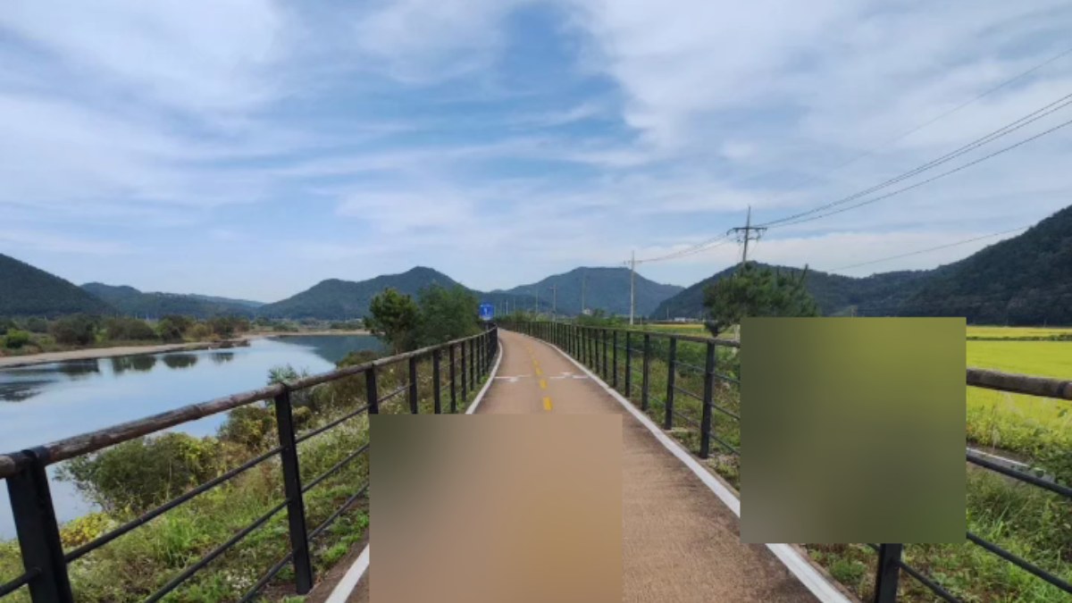 POV from bike handlebars Korea 4 Rivers dedicated cycling path river valley