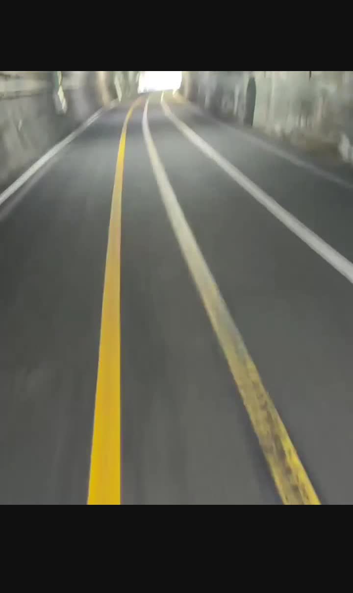 Cycling through tunnel 4 Rivers Korea yellow line