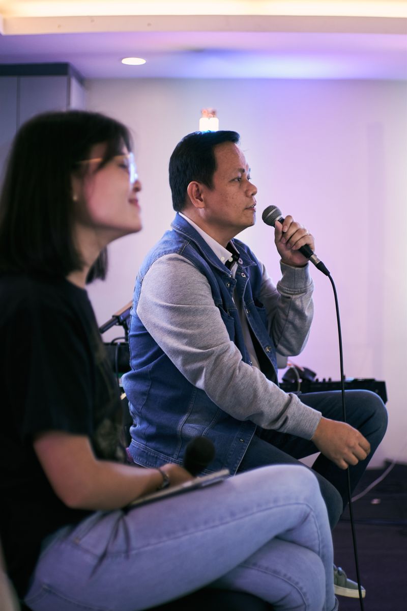 Karaoke couple singing together